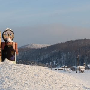 Figure of Babno Polje woman in snow